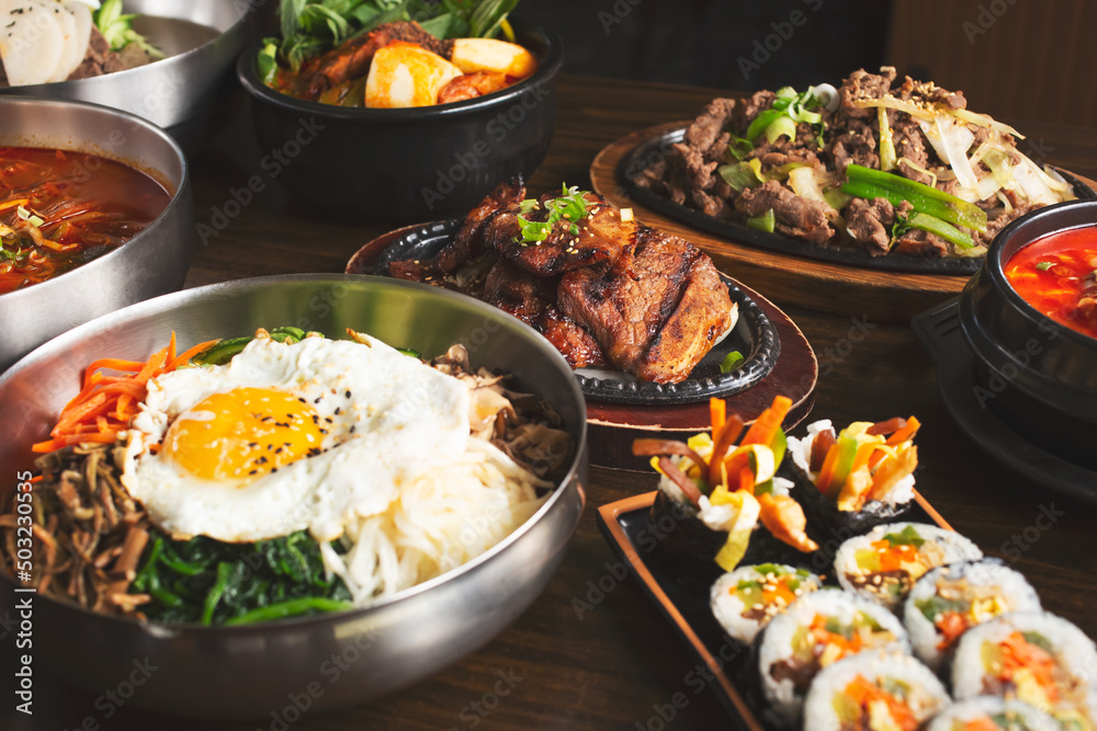A view of several Korean entrees on the table. A view of several Korean entrees on the table.