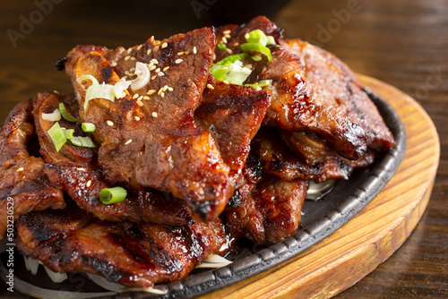 A view of a plate of kalbi. photo