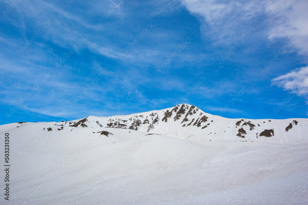 Snow-capped Caucasus Mountains landscape. Karachay-Cherkessia, Russia