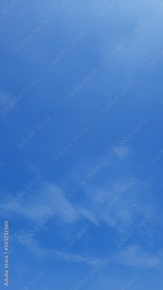 Blue sky background with thin clouds in Indonesian sky Blue sky background with thin clouds in Indonesian sky