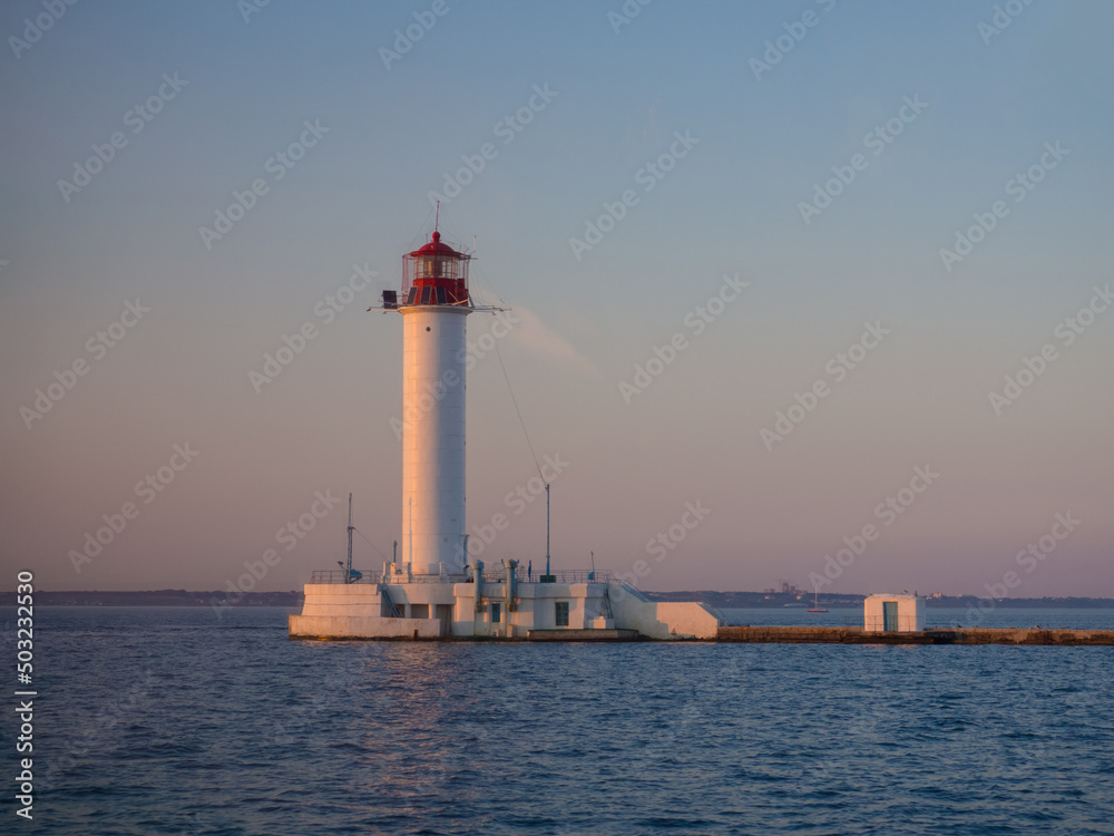 The Vorontsov Lighthouse in the Black Sea port of Odessa, Ukraine in the evening. The current lighthouse is the third to stand on the same spot. The first was built in 1862 and was made of wood.