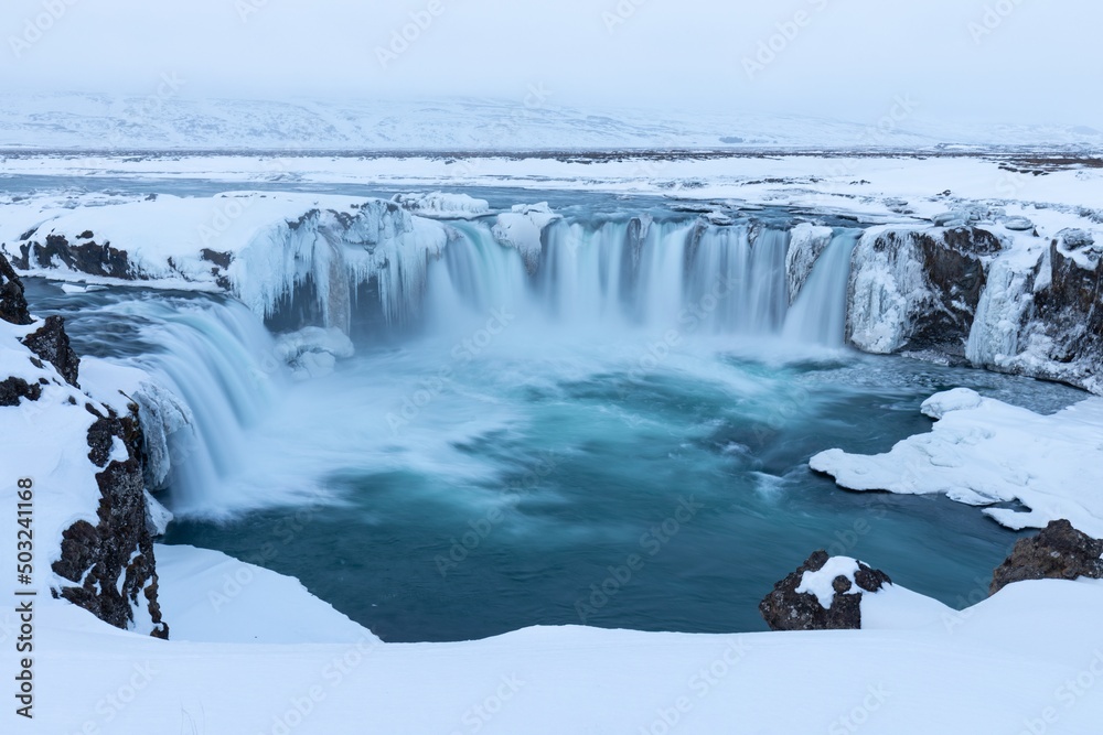 Godafoss waterfall at sunset in winter, Iceland.