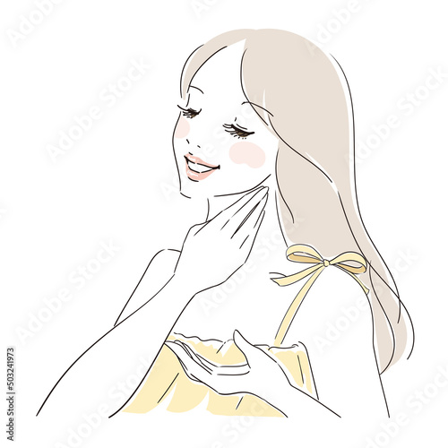 首に日焼け止めを塗るロングヘアの可愛い女性　