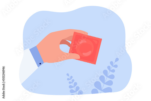 Hand of doctor holding condom packaging. Gynecologist or pharmacist holding contraceptive flat vector illustration. Medicine, protection, health concept for banner, website design or landing web page
