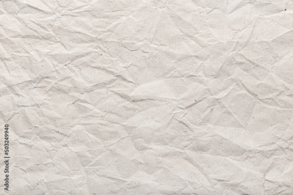 Obraz premium Crumpled paper background texture. Brown paper background
