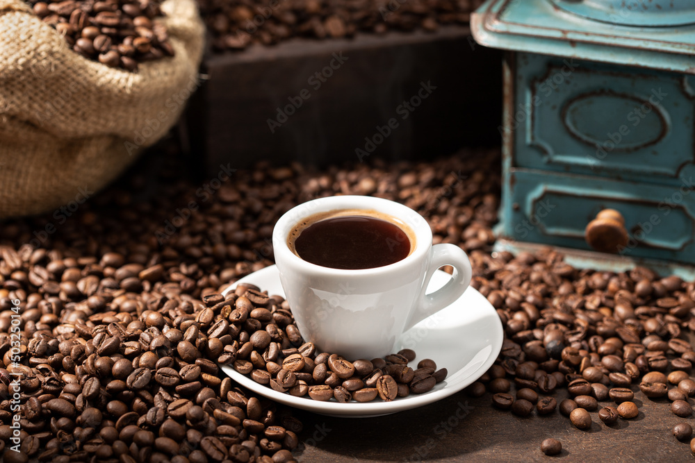 Cup Of espresso Coffee and roasted beans Cup Of espresso Coffee and roasted beans