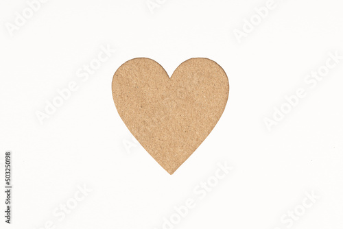 Die-cut Cardboard Heart shaped isolated on white paper background. Love concept