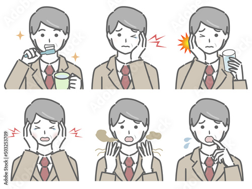 口の中に異常があるスーツの中年男性