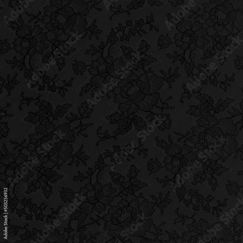 Black lace fabric with a floral ornament. Luxury background in vintage style.