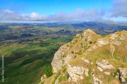 The summit of Te Mata Peak, a mountain in the Hawke's Bay region, New Zealand, with a panoramic view of the farmland of the Tukituki Valley