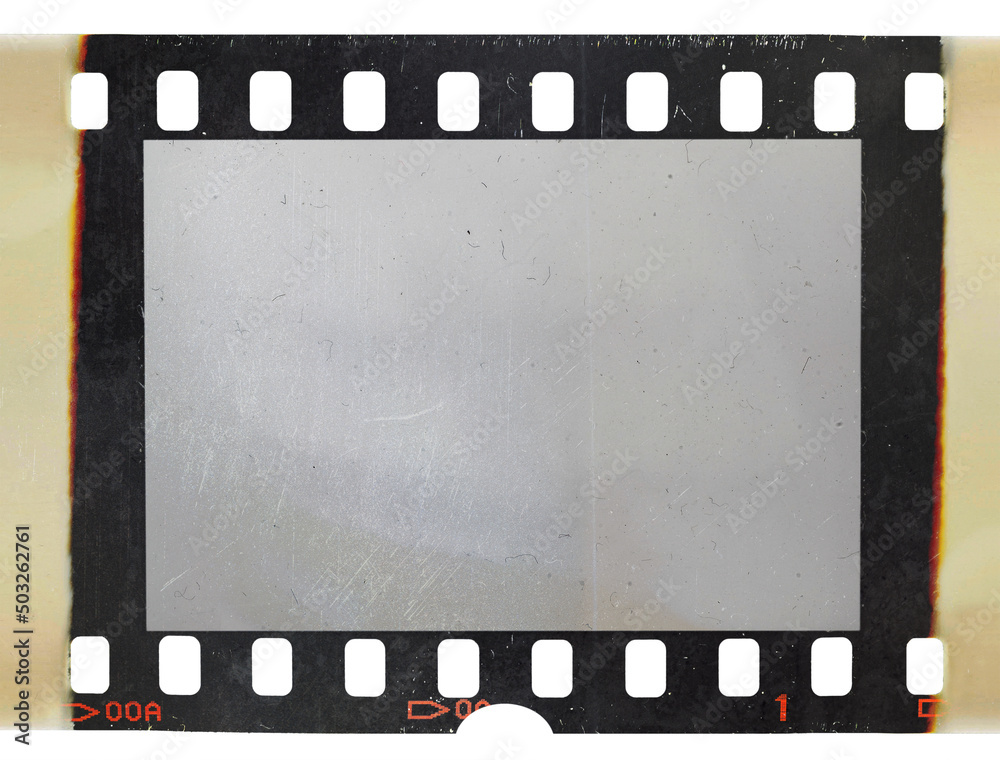 single 35mm film strip with burned edges or sides isolated on white background. detail scan of film material. - obrazy, fototapety, plakaty 