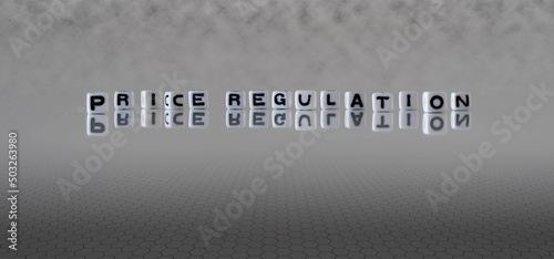 price regulation word or concept represented by black and white letter cubes on a grey horizon background stretching to infinity