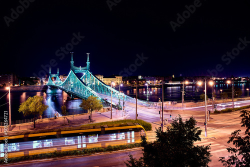 Photography Budapest, Liberty Bridge in night with yellow tram, aerial view