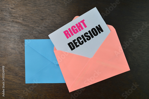 Envelopes and white paper written with RIGHT DECISION