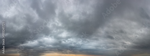 Fantastic soft thunderclouds at sunrise, natural composition