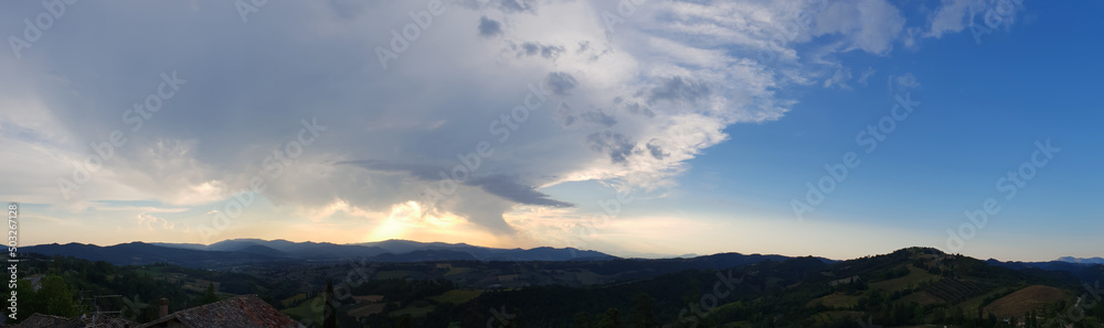Beautiful panorama of the Umbrian landscape at sunset in summer.