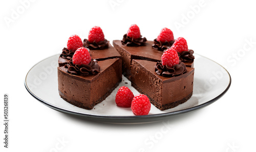 Creamy dark chocolate cheesecake with chocolate Oreo biscuits and raspberries. isolated on white background photo