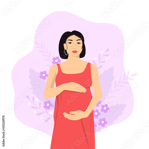 Pregnant asian woman with hands over her belly.