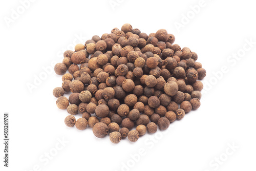 Big bunch of spice Allspice (Jamaica pepper, Pimento) on white background. Indian cuisine concept