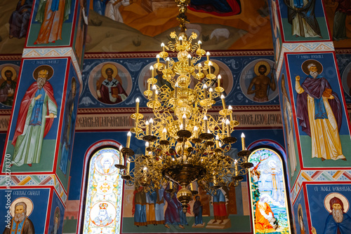 Orthodox Church Europe. Bright blue vintage interior of an ancient historic Greek church. photo