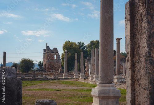 Agora columns with great sky viewin Perge or Perga ancient Greek city - once capital of Pamphylia in Antalya Turkey on warm October afternoon. photo