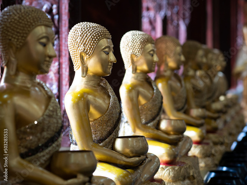 Buddha statue at Wat Nong Waeng, a temple at Khon Kaen provience, Thailand. spot focus photo