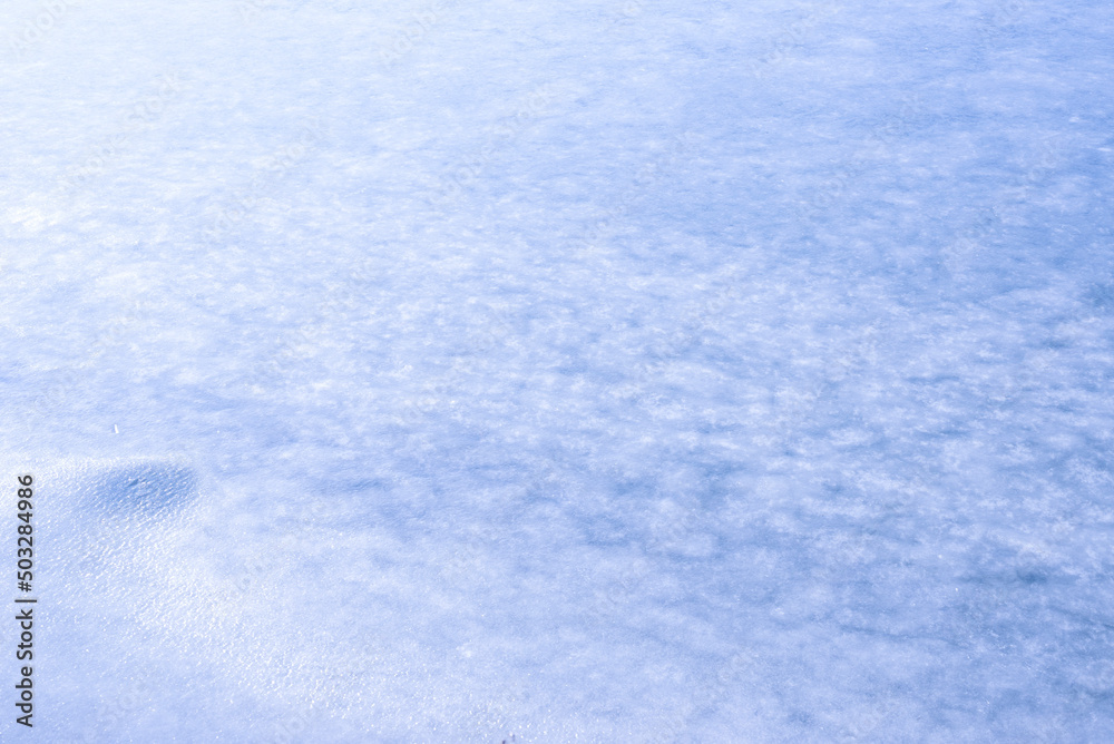 Natural texture of ice, frozen lake  as  background.