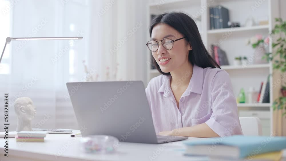 Positive woman freelancer having online video call with work team, brainstorm Positive woman freelancer having online video call with work team, brainstorm