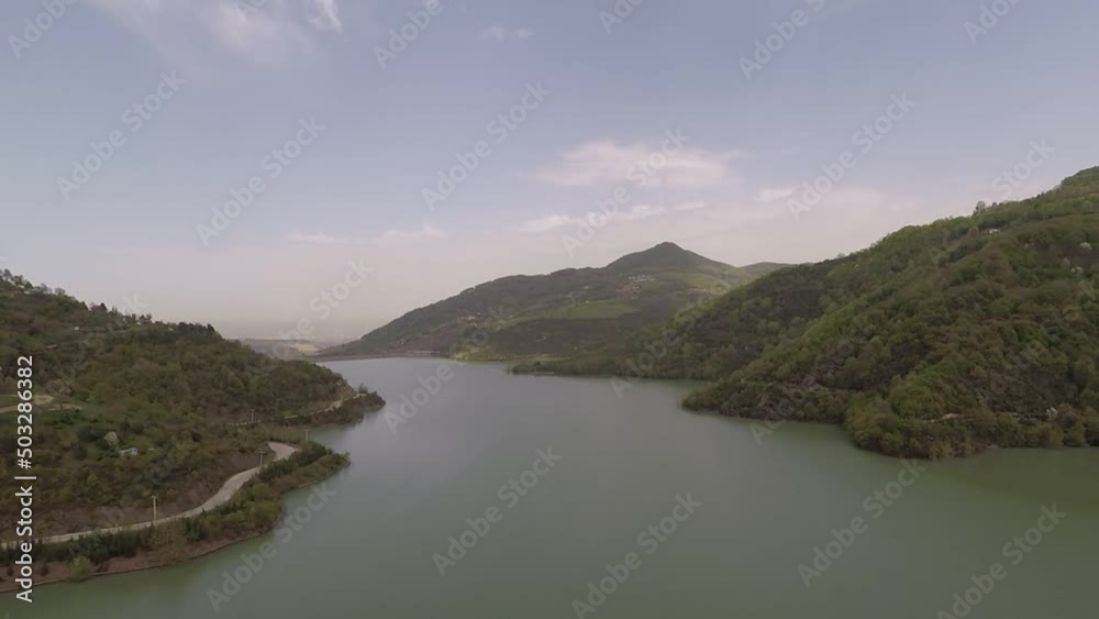 aerial long lake and mountains, blue sky aerial long lake and mountains, blue sky