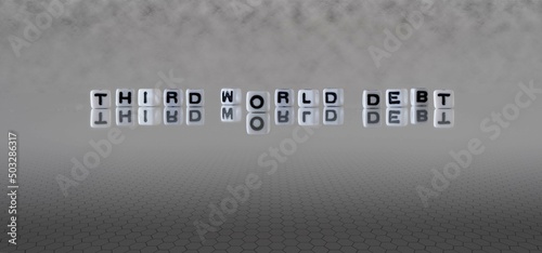 Bilde på lerret third world debt word or concept represented by black and white letter cubes on
