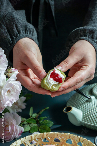 Photography Japanese dessert mochi with matcha green tea powder and cherry,     japanese tea