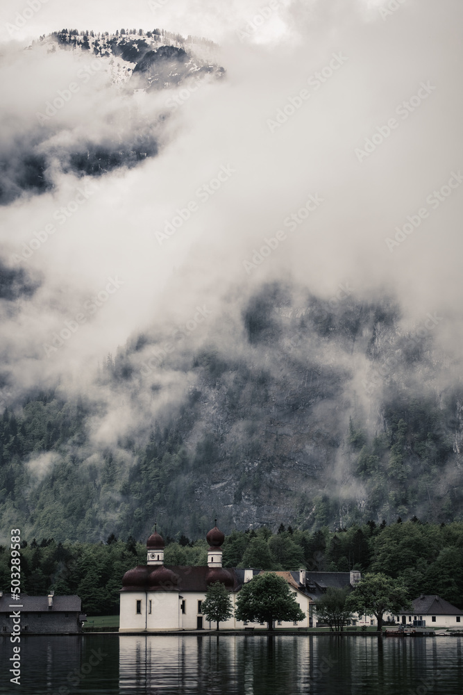 Dramatic fog dark mood in the snow covered mountains - Königssee Alps