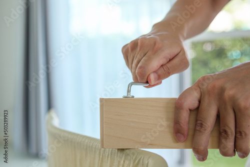 Canvas Print Assembly wooden furniture at home using screw allen