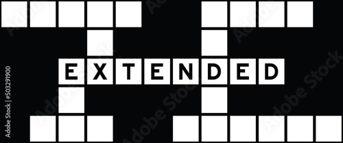 Alphabet letter in word extended on crossword puzzle background
