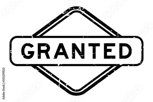 Grunge black granted word rubber seal stamp on white background