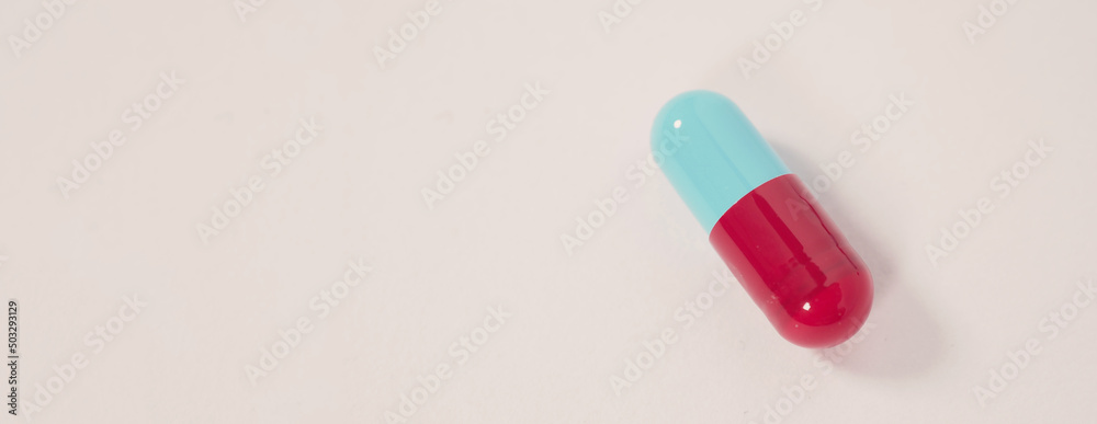 Taking or holding medication pills in hand. Capsule pill on white background isolated. Nitrile disposable gloves and medicines. Drugs healthcare treatment and supplement relieve symptoms of COVID 19. Taking or holding medication pills in hand. Capsule pill on white background isolated. Nitrile disposable gloves and medicines. Drugs healthcare treatment and supplement relieve symptoms of COVID 19.