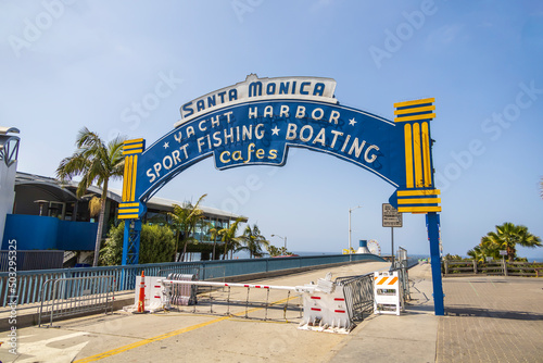 Big blue and yellow Santa Monica Pier sign photo
