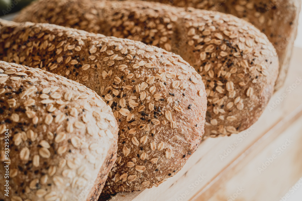 Fresh homemade bread from whole grain flour with the oatmeal flakes Fresh homemade bread from whole grain flour with the oatmeal flakes