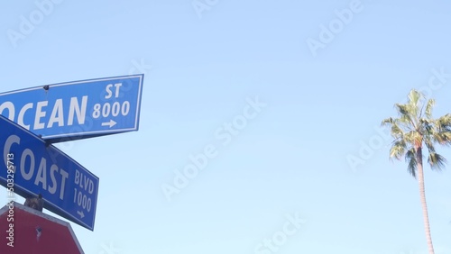 Obraz na plátně Ocean street road sign on crossroad, California city, USA