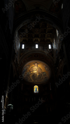 Inner view of the Pisa Cathedral, with light and darkness.