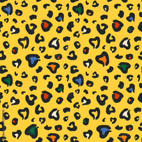 Spots on a yellow background. Leopard skin. Seamless pattern for any use.
