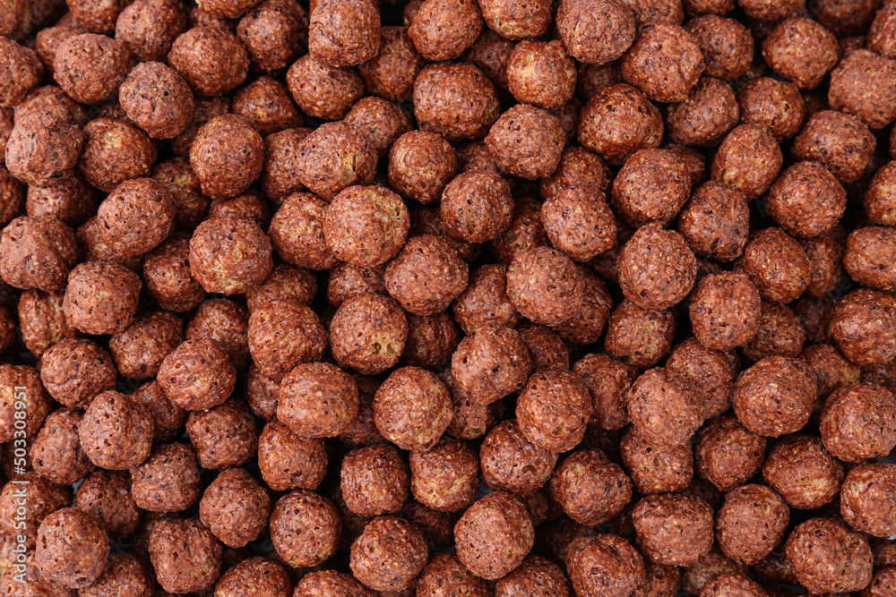 Sweet crispy chocolate corn balls as background, top view Sweet crispy chocolate corn balls as background, top view