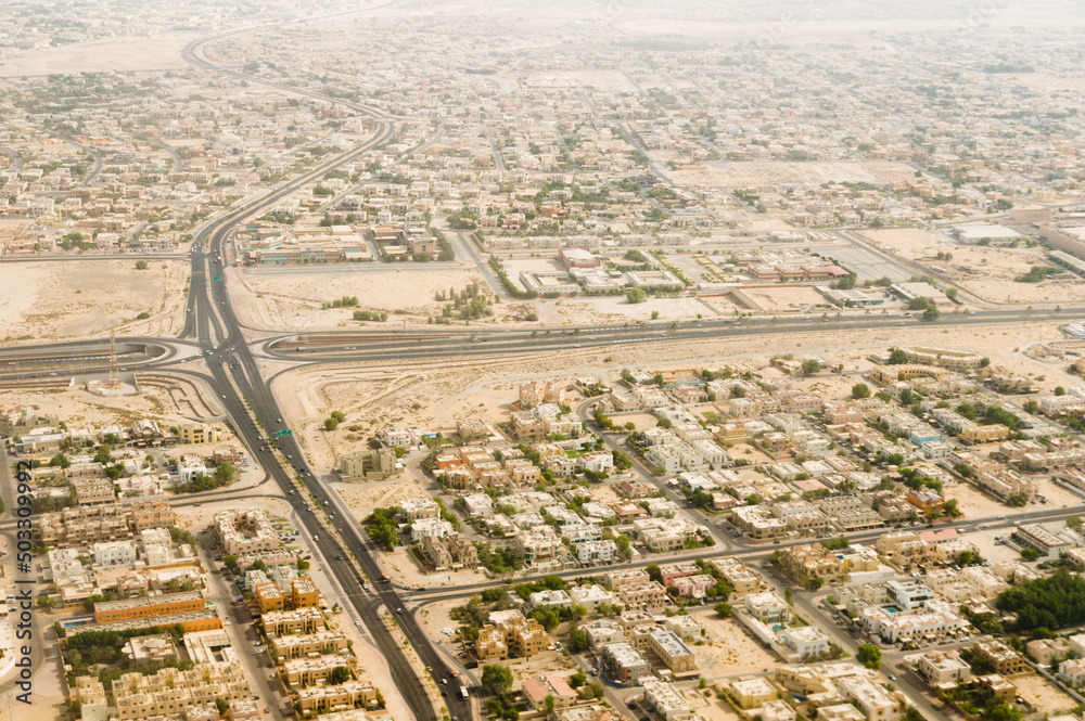 Aerial view of highway running through a middle eastern city