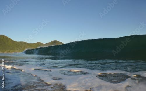  waves on a beach in the Caribbean Sea, paradise of surfing