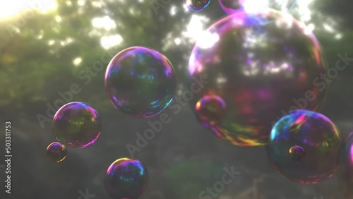 Colorful soap bubbles floating in the forest. 3d rendering animation.