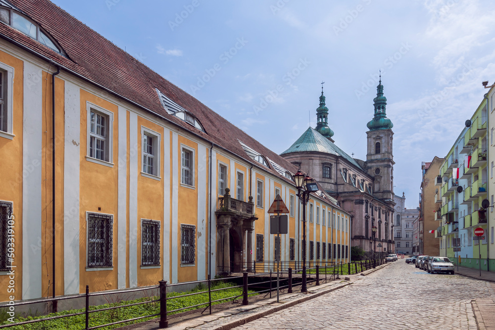 Church of the Assumption of the Blessed Virgin Mary (Kościół Wniebowzięcia Najświętszej Marii Panny) and Bishop's Court surrounded by historical buildings of the Old Town in Nysa, Poland.