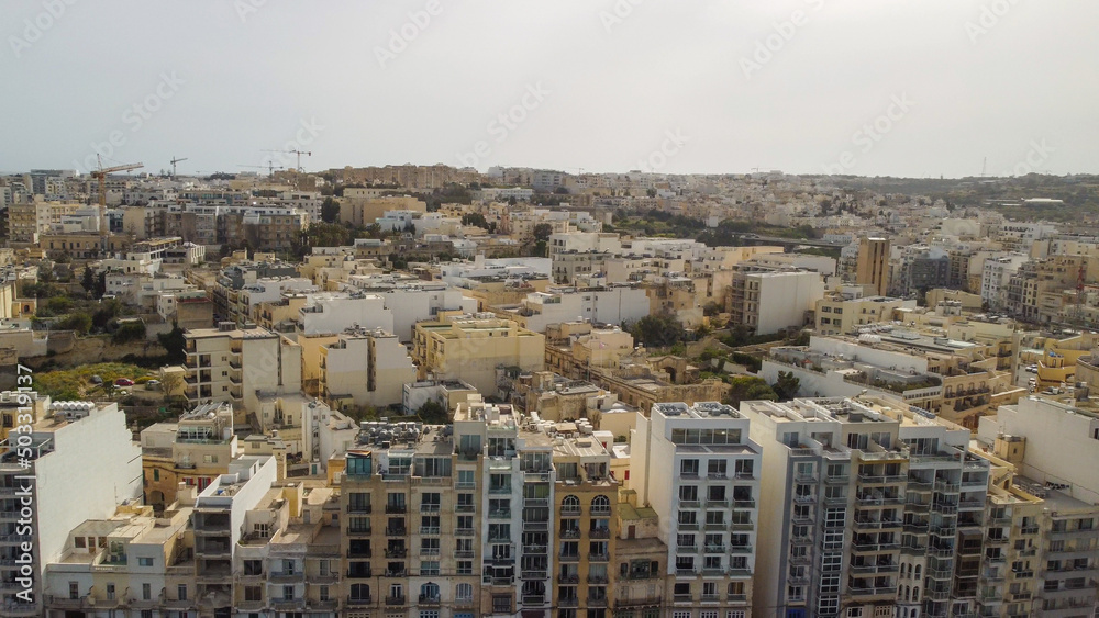 St Julien, Malta - April 20, 2022: Aerial view of Spinola Bay in St Julien, Malta Island