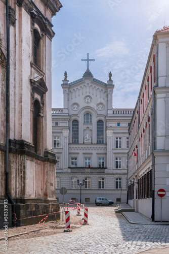 .Headquaters of Religious Congregation of the Sisters of St. Elizabeth (Zgromadzenie Zakonne Sióstr św. Elżbiety) in Nysa, Poland. .Classicist house surrounded by other buildings of the Old Town. photo