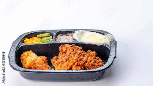 Fried Chicken TV dinner with potatoes and vegetable