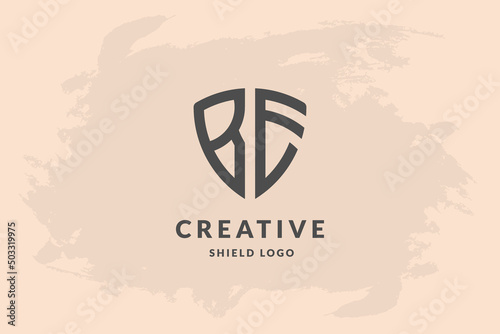 Initial letter be in shape of shield. Handwriting vector logo design illustration image